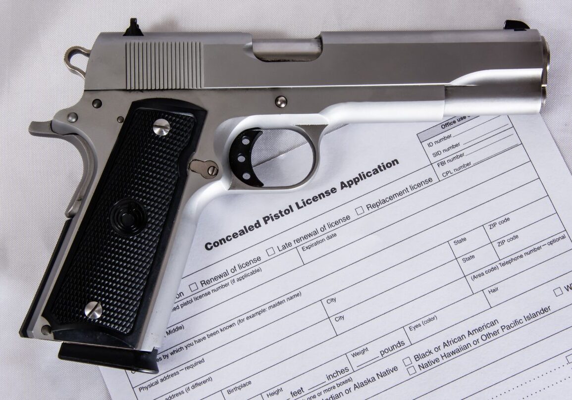 Handgun on concealed pistol license application form.